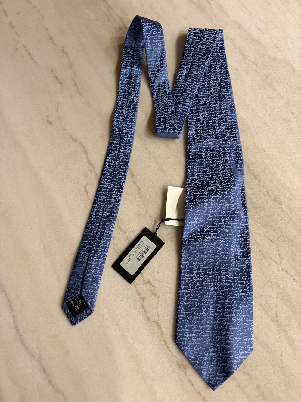 Gucci Blue Silk Tie, featuring a signature monogram pattern blue silk New tags
